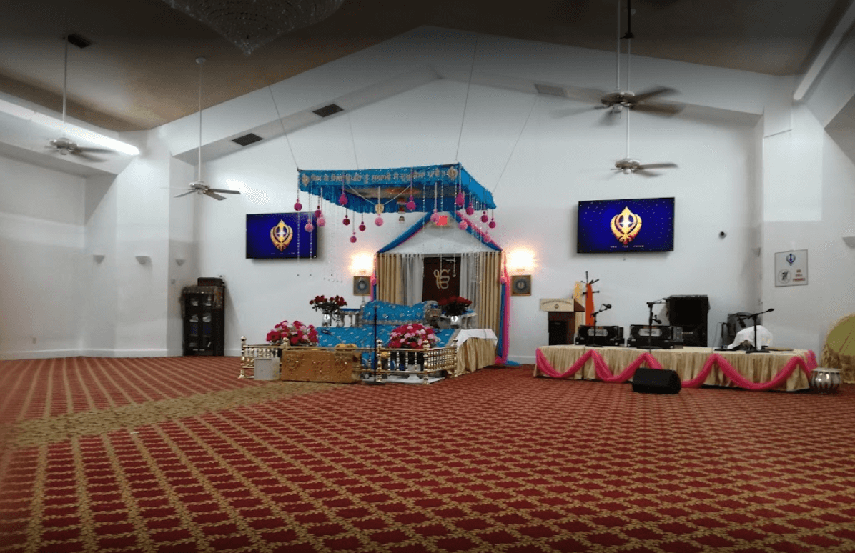 The Darbar Sahib (main prayer hall) with the decorated Palki Sahib inside the Gurdwara