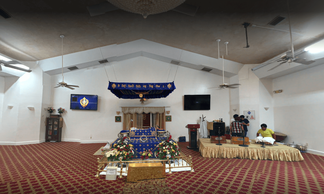 Wide view of the Darbar Sahib with the rumala canopy over Guru Granth Sahib Ji