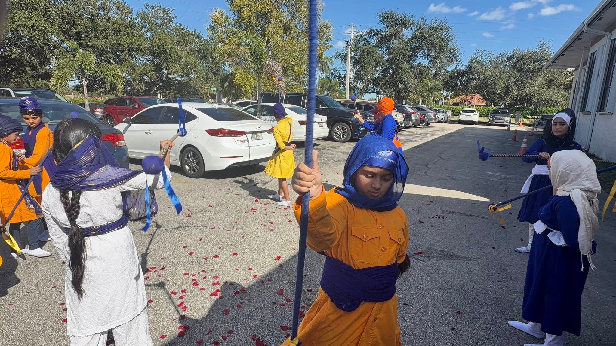 Children demonstrating Gatka, the traditional Sikh martial art, at a celebration
