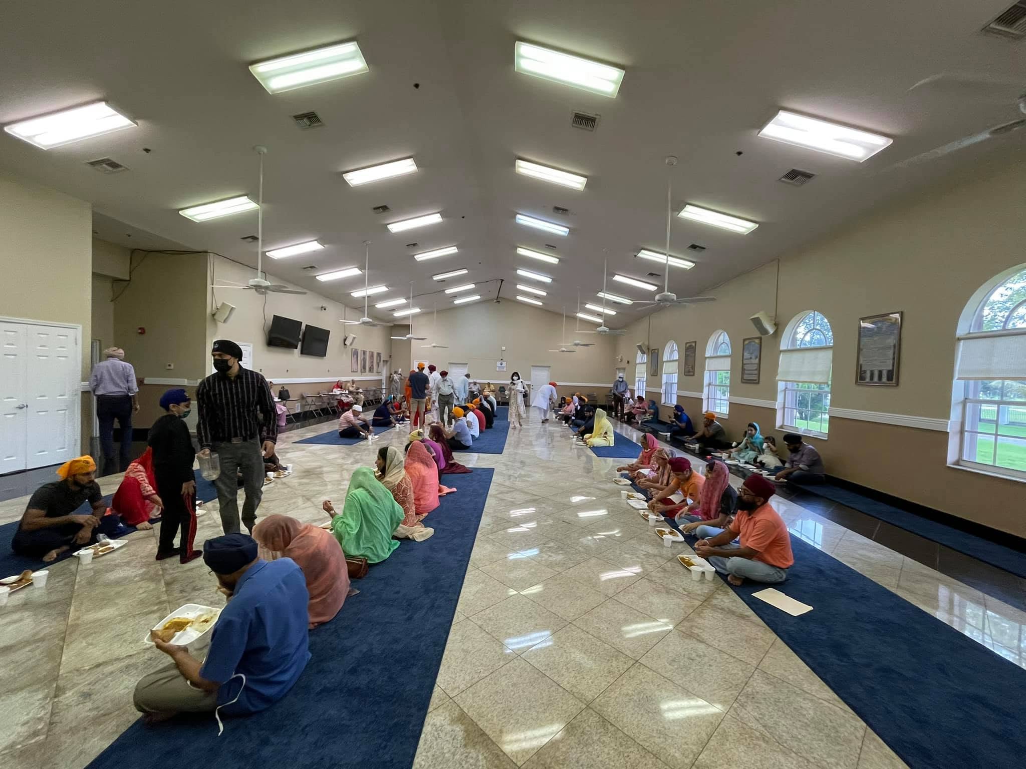 The Langar hall during a community meal