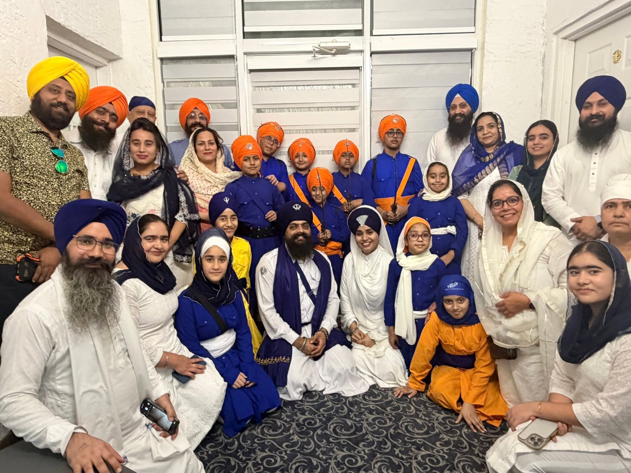 The Sangat gathered together as one family