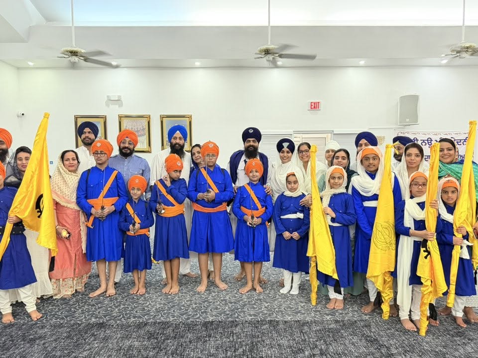 Punjabi School children in Khalsa dress with flags
