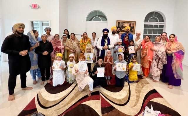 Punjabi School students and teachers with their artwork
